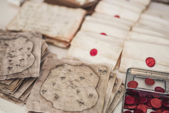 Pirate maps and wax seals for the Society of Curiosities mystery subscription box game.