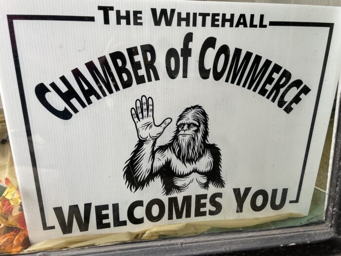 Whitehall New York chamber of commerce bigfoot sign at the Sasquatch calling festival
